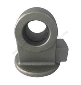 Close-up of CNC machining process on forged steel hydraulic cylinder base showing precision tooling marks